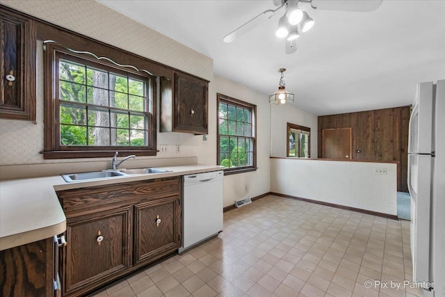 50 Southgate Crse, Saint Charles, IL 60174 - kitchen with white appliances, wallpapered walls, a sink, light countertops, and ceiling fan
