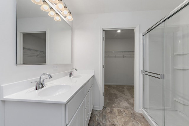 32009 Savannah Dr, Lakemoor, IL 60051 - bathroom with a shower stall, a spacious closet, and double vanity