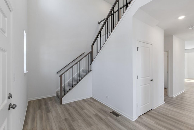 32009 Savannah Dr, Lakemoor, IL 60051 - stairway featuring baseboards, visible vents, and wood finished floors