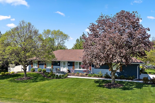 view of front of home with a front yard
