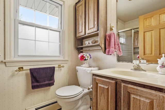 bathroom featuring toilet, wallpapered walls, vanity, baseboard heating, and an enclosed shower