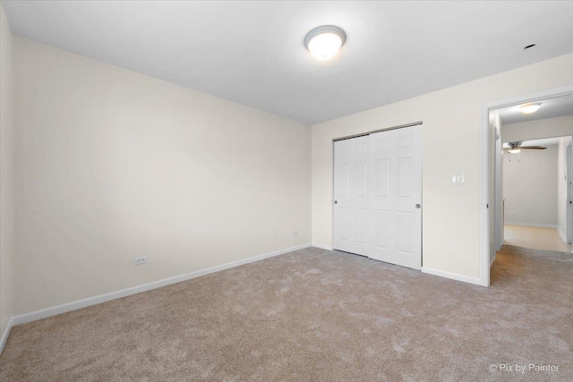 2221 W Nichols Rd Unit A, Arlington Heights, IL 60004 - unfurnished bedroom featuring carpet flooring, baseboards, and a closet