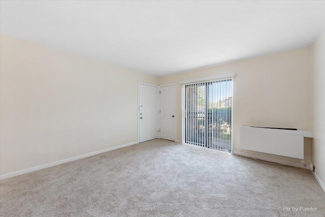 2221 W Nichols Rd Unit A, Arlington Heights, IL 60004 - carpeted spare room with baseboards