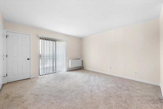 2221 W Nichols Rd Unit A, Arlington Heights, IL 60004 - carpeted empty room with baseboards