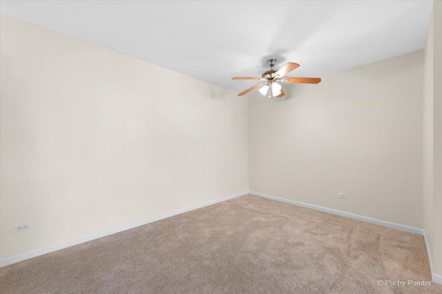 2221 W Nichols Rd Unit A, Arlington Heights, IL 60004 - carpeted empty room featuring ceiling fan and baseboards
