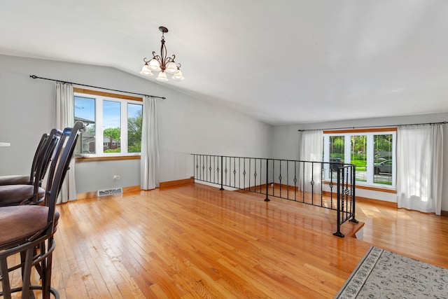 15325 Walnut Rd, Oak Forest, IL 60452 - unfurnished office with plenty of natural light, light wood-style flooring, lofted ceiling, a chandelier, and baseboards