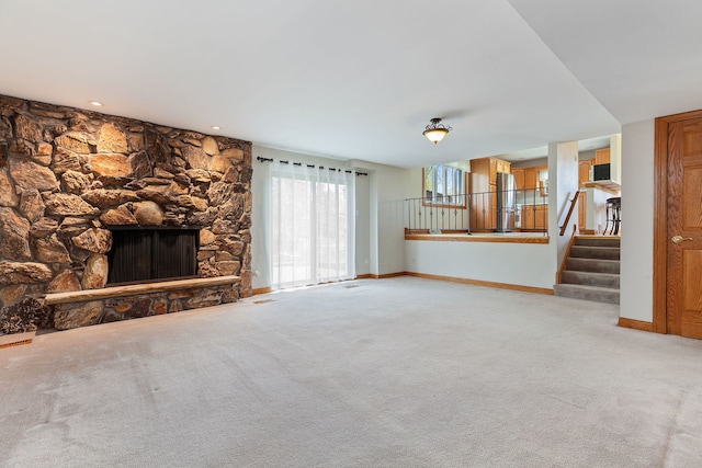 15325 Walnut Rd, Oak Forest, IL 60452 - unfurnished living room with a stone fireplace, baseboards, stairway, and carpet