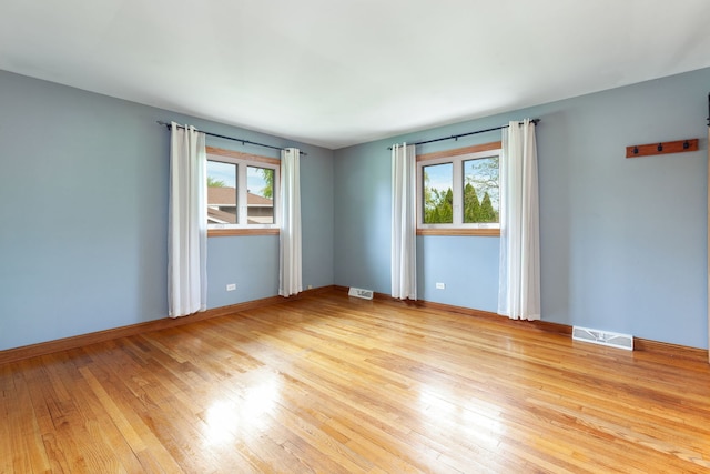 15325 Walnut Rd, Oak Forest, IL 60452 - spare room featuring hardwood / wood-style flooring and baseboards