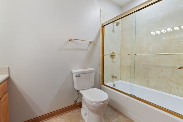 15325 Walnut Rd, Oak Forest, IL 60452 - bathroom with toilet, vanity, combined bath / shower with glass door, baseboards, and tile patterned flooring