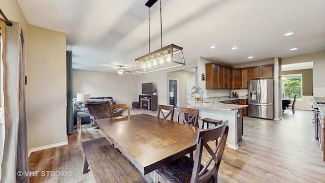 3756 Innesbrook Ct, Algonquin, IL 60102 - dining area with light wood finished floors, ceiling fan, and recessed lighting