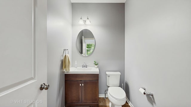3756 Innesbrook Ct, Algonquin, IL 60102 - half bath with vanity, toilet, baseboards, and wood finished floors