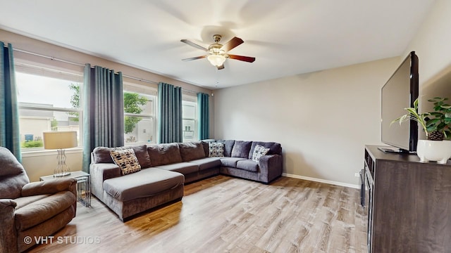 3756 Innesbrook Ct, Algonquin, IL 60102 - living area with a ceiling fan, light wood-style floors, and baseboards