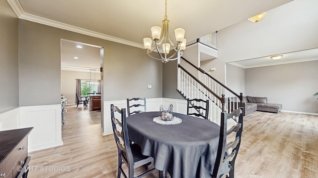 3756 Innesbrook Ct, Algonquin, IL 60102 - dining room with a chandelier, light wood-style floors, ornamental molding, and a wainscoted wall