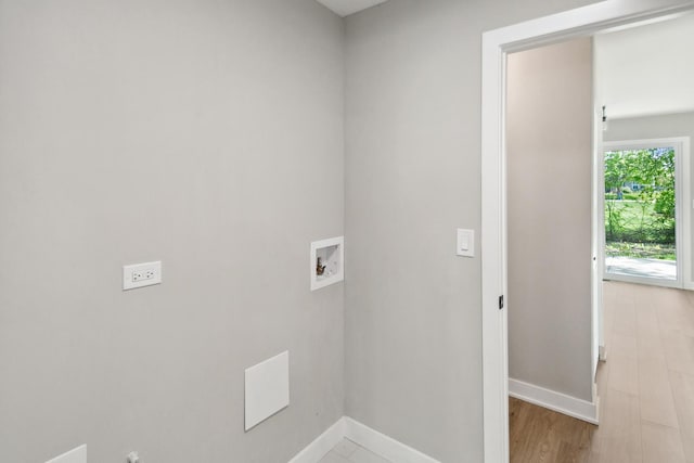 5736 Timberlane Rd, Matteson, IL 60443 - clothes washing area with hookup for a washing machine, baseboards, and light wood-type flooring