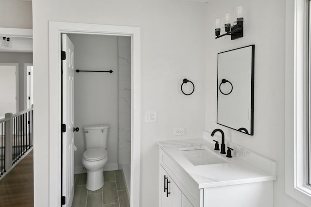 5736 Timberlane Rd, Matteson, IL 60443 - bathroom featuring vanity, toilet, and baseboards