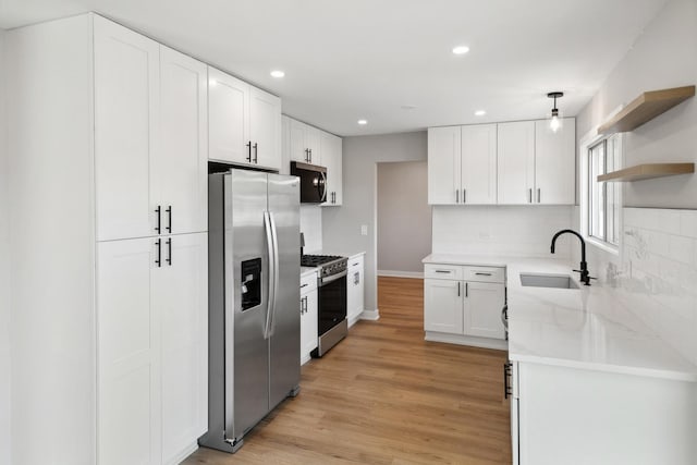 5736 Timberlane Rd, Matteson, IL 60443 - kitchen featuring stainless steel appliances, a sink, recessed lighting, white cabinets, and tasteful backsplash