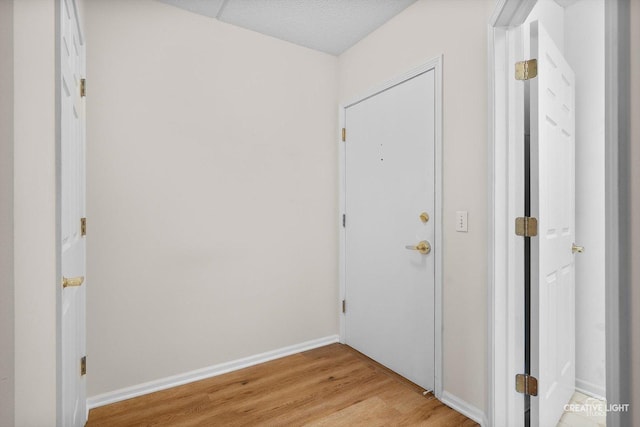 100 N Gary Ave Unit 308, Wheaton, IL 60187 - corridor with light wood-type flooring and baseboards