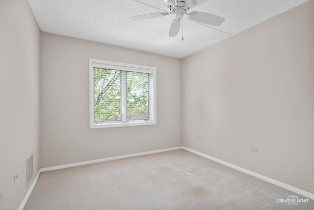 100 N Gary Ave Unit 308, Wheaton, IL 60187 - carpeted spare room featuring a ceiling fan, a textured ceiling, and baseboards