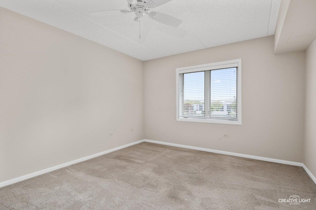 100 N Gary Ave Unit 308, Wheaton, IL 60187 - carpeted empty room featuring baseboards and ceiling fan