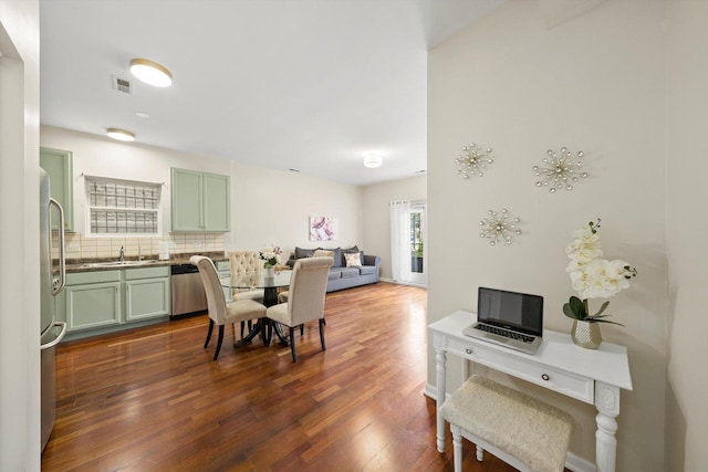 dining room featuring dark wood finished floors