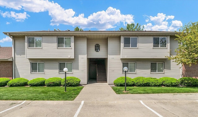 1109 Laura Dr Unit 9, Champaign, IL 61822 - view of building exterior with uncovered parking