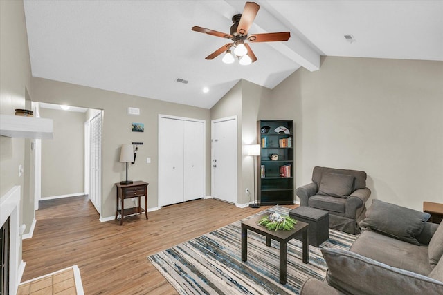 1109 Laura Dr Unit 9, Champaign, IL 61822 - living room featuring light wood-type flooring, ceiling fan, and baseboards