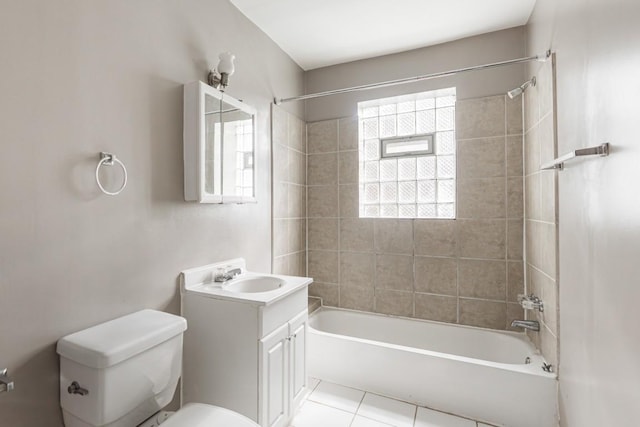 full bathroom with shower / tub combination, toilet, vanity, and tile patterned flooring