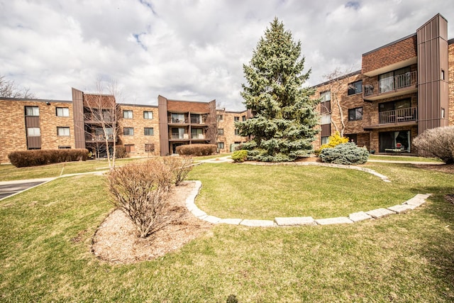 view of community with a lawn