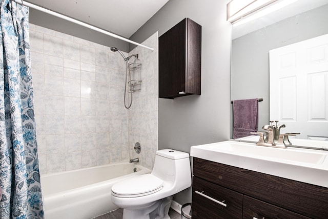full bath featuring toilet, shower / bath combination with curtain, and vanity