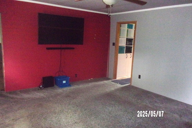 704 E Sycamore St, Watseka, IL 60970 - unfurnished living room featuring ceiling fan, carpet flooring, and ornamental molding