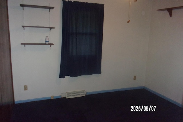 704 E Sycamore St, Watseka, IL 60970 - empty room featuring baseboards