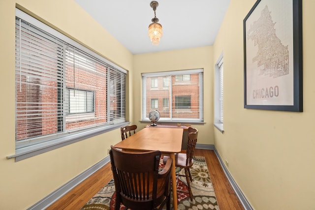 office space featuring wood finished floors and baseboards