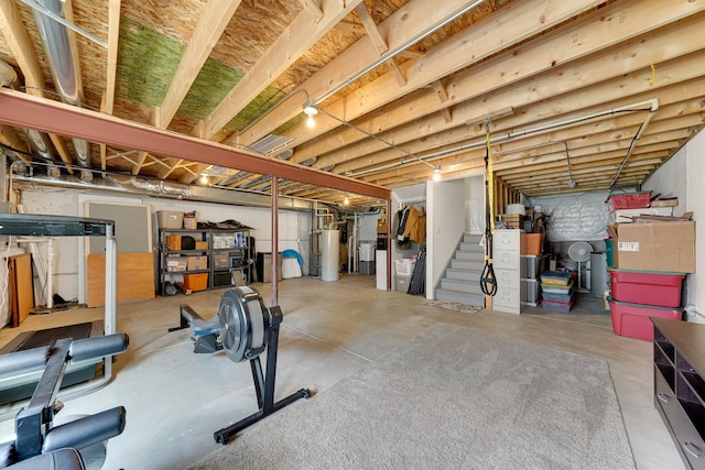 unfinished below grade area with gas water heater and stairs