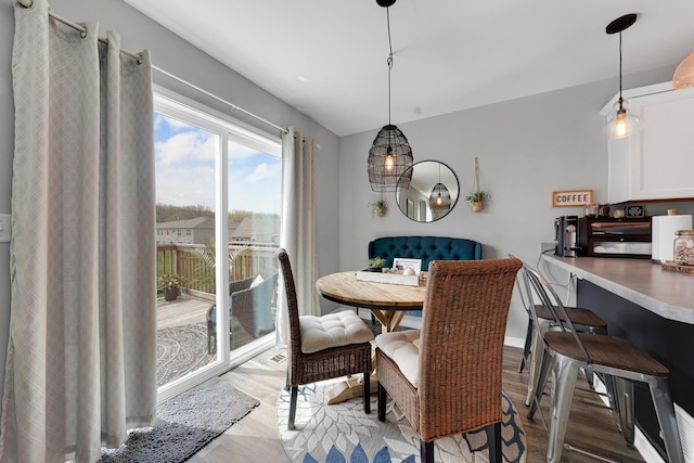 dining room with light wood-style floors