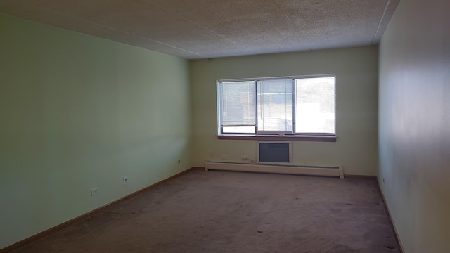 835 Pearson St Unit 305, Des Plaines, IL 60016 - carpeted empty room with a baseboard radiator and baseboards