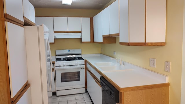 835 Pearson St Unit 305, Des Plaines, IL 60016 - kitchen featuring white appliances, a sink, under cabinet range hood, light countertops, and white cabinets