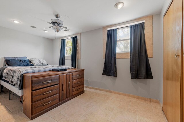 bedroom with baseboards, recessed lighting, and a ceiling fan