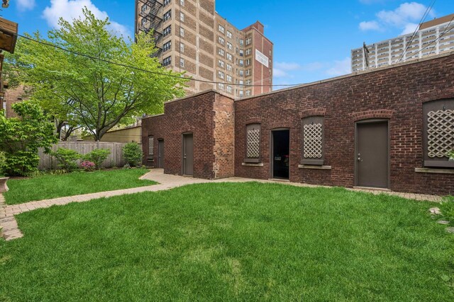 921 W Gunnison St Unit 1W, Chicago, IL 60640 - back of property featuring brick siding