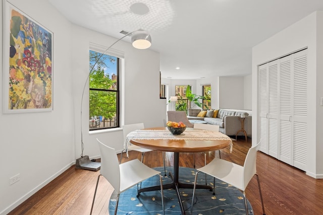 921 W Gunnison St Unit 1W, Chicago, IL 60640 - dining area with wood finished floors, plenty of natural light, baseboards, and recessed lighting