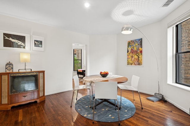 921 W Gunnison St Unit 1W, Chicago, IL 60640 - dining room featuring hardwood / wood-style floors and baseboards