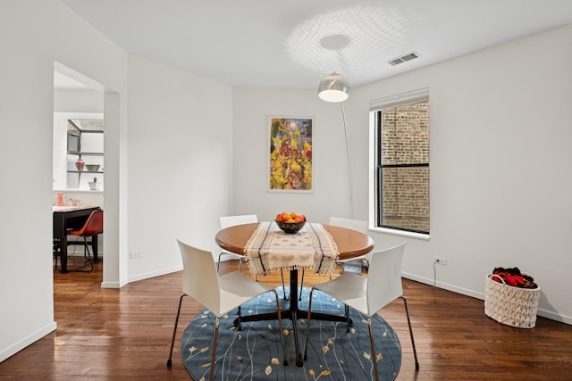 921 W Gunnison St Unit 1W, Chicago, IL 60640 - dining room with wood-type flooring and baseboards