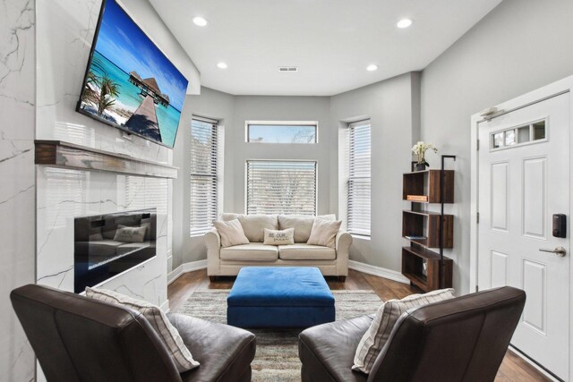443 E 45th Pl Unit 3, Chicago, IL 60653 - living area with recessed lighting, wood finished floors, and baseboards