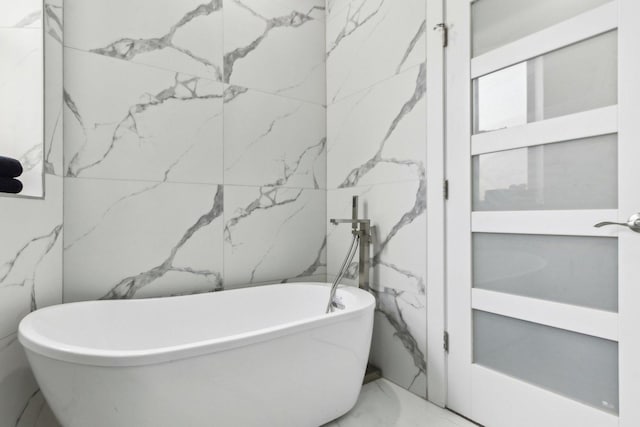 443 E 45th Pl Unit 3, Chicago, IL 60653 - full bath with marble finish flooring and a freestanding bath