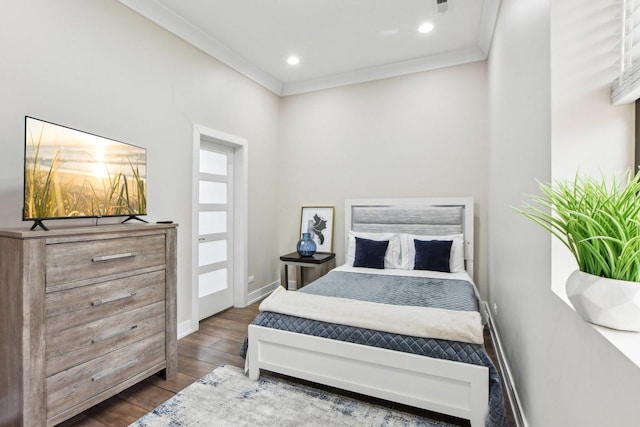 443 E 45th Pl Unit 3, Chicago, IL 60653 - bedroom with dark wood-type flooring, crown molding, baseboards, and recessed lighting