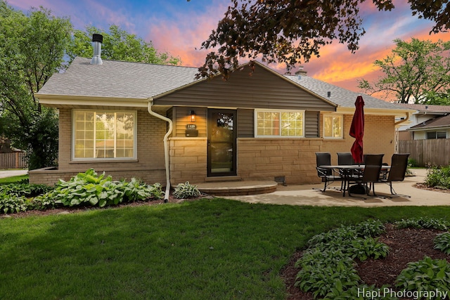1129 Longmeadow Dr, Glenview, IL 60025 - rear view of property with a patio area, roof with shingles, and brick siding