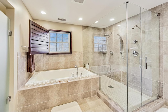 2020 Techny Rd, Northbrook, IL 60062 - full bathroom featuring a stall shower, a bath, visible vents, tile patterned flooring, and recessed lighting
