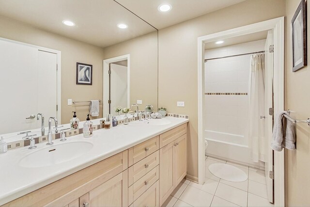 2020 Techny Rd, Northbrook, IL 60062 - full bath with a sink, toilet, recessed lighting, tile patterned flooring, and double vanity