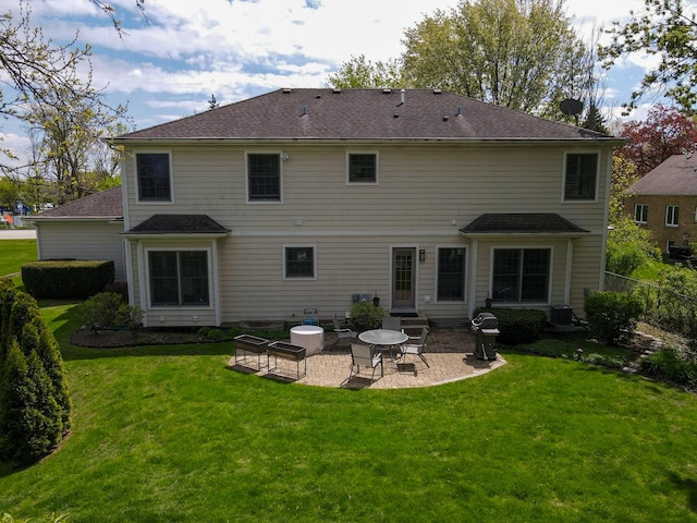 2020 Techny Rd, Northbrook, IL 60062 - back of house with a patio, roof with shingles, fence, and a lawn