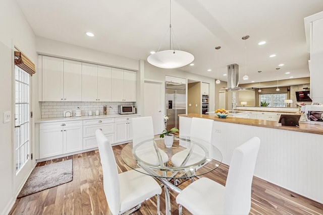 2020 Techny Rd, Northbrook, IL 60062 - dining space featuring light wood finished floors and recessed lighting