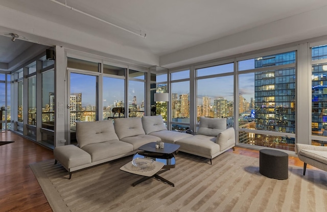 333 N Canal St Unit 3401, Chicago, IL 60606 - sunroom featuring a view of skyline, wood finished floors, floor to ceiling windows, and plenty of natural light